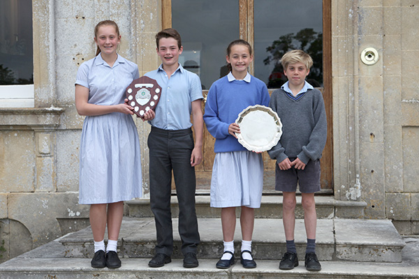 Athletes with the Port Regis and Monkton Festival trophies