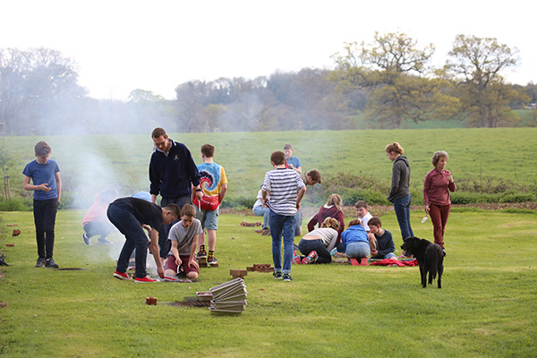 Cooking the BBQ on the fire pits