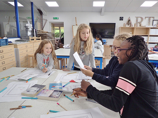 Boarders enjoying being createive in the brand-new art room