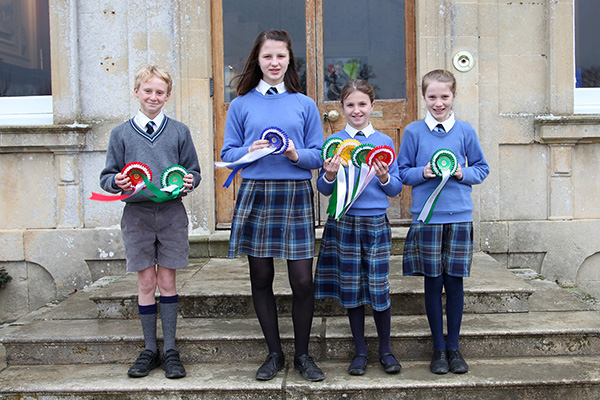 The successful KSEC Eventers Team Challenge riders with their rosettes