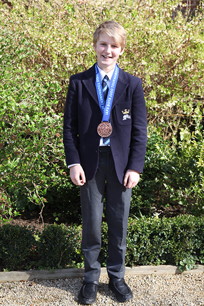 Joe C with his IAPS Judo Bronze Medal
